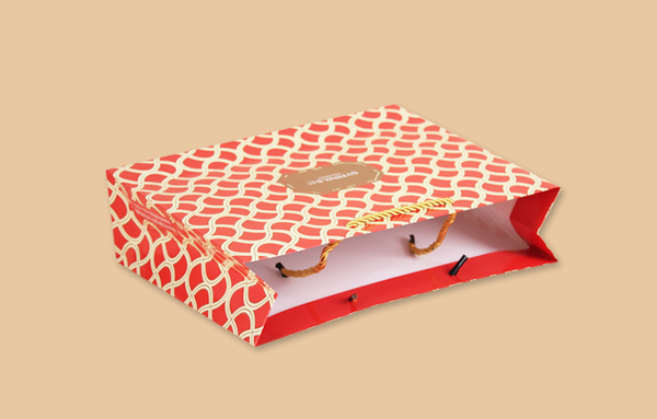 衣服禮品袋訂制-廣州駿業(yè)包裝實(shí)業(yè)有限公司 衣服禮品袋訂制